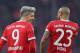MUNICH, GERMANY - DECEMBER 02: Arturo Vidal of FC Bayern Muenchen celebrates with team mate Robert Lewandowski after scoring his team's first goal during the Bundesliga match between FC Bayern Muenchen and Hannover 96 at Allianz Arena on December 2, 2017 in Munich, Germany. (Photo by Boris Streubel/Getty Images)