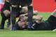 MADRID, SPAIN - MAY 3: Laurent Koscielny of Arsenal is seriously injured during the UEFA Europa League Semi Final second leg match between Atletico Madrid and Arsenal FC at Estadio Wanda Metropolitano on May 3, 2018 in Madrid, Spain. (Photo by Jean Catuffe/Getty Images)