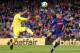 Villarreal's Spanish defender Alvaro Gonzalez (L) challenges Barcelona's Brazilian midfielder Philippe Coutinho during the Spanish league football match between Barcelona and Villarreal at the Camp Nou Stadium in Barcelona on May 9, 2018. (Photo by Pau Barrena / AFP) (Photo credit should read PAU BARRENA/AFP/Getty Images)