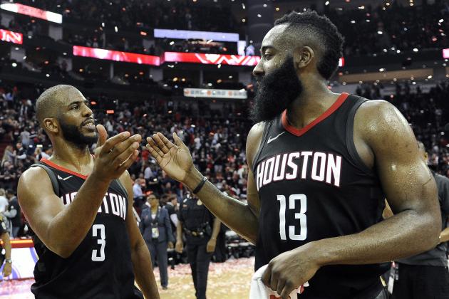 Houston Rockets guard Chris Paul (3) and James Harden celebrate the team's win over the Utah Jazz during Game 5 of an NBA basketball second-round playoff series, Tuesday, May 8, 2018, in Houston. (AP Photo/Eric Christian Smith)