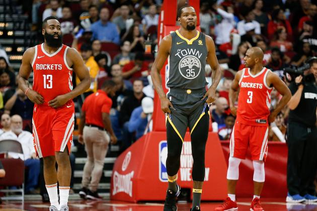 HOUSTON, TX - JANUARY 20:   James Harden #13 of the Houston Rockets, Kevin Durant #35 of the Golden State Warriors and Chris Paul #3 of the Houston Rockets at Toyota Center on January 20, 2018 in Houston, Texas. NOTE TO USER: User expressly acknowledges and agrees that, by downloading and or using this photograph, User is consenting to the terms and conditions of the Getty Images License Agreement.  (Photo by Bob Levey/Getty Images)
