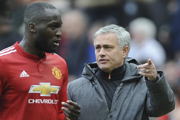Manchester United manager Jose Mourinho talks to Manchester United's Romelu Lukaku during the English Premier League soccer match between Manchester United and Liverpool at Old Trafford in Manchester, England, Saturday, March 10, 2018. (AP Photo/Rui Vieira)