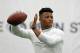 Penn State running back Saquon Barkley, tosses a football during Penn State Pro Day in State College, Pa., Tuesday, March 20, 2018. Barkley did not participate in the drills. (AP Photo/Gene J. Puskar)