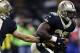NEW ORLEANS, LA - AUGUST 26: Drew Brees #9 of the New Orleans Saints hands the ball to Adrian Peterson #28 during the first half of a preseason game against the Houston Texans at the Mercedes-Benz Superdome on August 26, 2017 in New Orleans, Louisiana. (Photo by Jonathan Bachman/Getty Images)