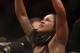 Wearing the champion's belt, Amanda Nunes, from Brazil, celebrates after defeating Raquel Pennington, from the United States, during their UFC women's bantamweight mixed martial arts bout in Rio de Janeiro, Brazil, early Sunday, May 13, 2018. (AP Photo/Leo Correa)