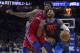 PHILADELPHIA, PA - DECEMBER 15: Paul George #13 of the Oklahoma City Thunder drives to the basket against Joel Embiid #21 of the Philadelphia 76ers in double overtime at the Wells Fargo Center on December 15, 2017 in Philadelphia, Pennsylvania. The Thunder defeated the 76ers 119-117 in triple overtime. NOTE TO USER: User expressly acknowledges and agrees that, by downloading and or using this photograph, User is consenting to the terms and conditions of the Getty Images License Agreement. (Photo by Mitchell Leff/Getty Images)