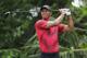 PONTE VEDRA BEACH, FL - MAY 13: Tiger Woods of the United States plays his shot from the fifth tee during the final round of THE PLAYERS Championship on the Stadium Course at TPC Sawgrass on May 13, 2018 in Ponte Vedra Beach, Florida. (Photo by Richard Heathcote/Getty Images)