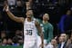 Boston Celtics guard Marcus Smart (36) and forward Jayson Tatum cheer from the bench along with injured Gordon Haywood who watches in street clothes, far right, during the fourth quarter of Game 1 of the NBA basketball Eastern Conference Finals against the Cleveland Cavaliers, Sunday, May 13, 2018, in Boston. The Celtics won 108-83. (AP Photo/Michael Dwyer)