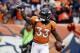 Denver Broncos running back De'Angelo Henderson (33) celebrates after a touchdown reception against the Kansas City Chiefs during the first half of an NFL football game Sunday, Dec. 31, 2017, in Denver. (AP Photo/Jack Dempsey)
