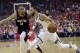 Golden State Warriors guard Stephen Curry (30) drives around Houston Rockets guard Gerald Green (14) during the first half of Game 1 of the NBA basketball Western Conference Finals, Monday, May 14, 2018, in Houston. (AP Photo/David J. Phillip)