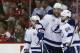 Tampa Bay Lightning center Brayden Point, left, defenseman Victor Hedman (77), from Sweden, and right wing Nikita Kucherov (86), from Russia, celebrate Kucherov's goal during the second period of Game 3 of the NHL Eastern Conference finals hockey playoff series against the Washington Capitals, Tuesday, May 15, 2018, in Washington. (AP Photo/Alex Brandon)