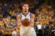 OAKLAND, CA - MAY 8: Klay Thompson #11 of the Golden State Warriors passes the ball against the New Orleans Pelicans in Game Five of the Western Conference Semifinals of the 2018 NBA Playoffs on May 8, 2018 at Oracle Arena in Oakland, California. NOTE TO USER: User expressly acknowledges and agrees that, by downloading and or using this photograph, user is consenting to the terms and conditions of Getty Images License Agreement. Mandatory Copyright Notice: Copyright 2018 NBAE (Photo by Garrett Ellwood/NBAE via Getty Images)