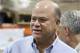 FILE - Int his May 10, 2016, file photo, billionaire hedge fund manager David Tepper mingles during a grand opening of rock star and philanthropist Jon Bon Jovi's Jon Bon Jovi Soul Foundation Soul Kitchen and B.E.A.T. Center, which stands for Bringing Everyone All Together, in Toms River, N.J. People familiar with the situation say Tepper has agreed to buy the Carolina Panthers from team founder Jerry Richardson for a record $2.2 billion. The people spoke to The Associated Press on Tuesday, May 15, 2018, on condition of anonymity because the team has not yet announced the sale. The purchase is subject to a vote at the NFL owners meeting next week in Atlanta. (AP Photo/Mel Evans, File)
