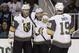 Vegas Golden Knights' Jonathan Marchessault, center, celebrates his goal with teammates William Karlsson, left, and Reilly Smith (19) during the second period of Game 6 of an NHL hockey second-round playoff series against the San Jose Sharks Sunday, May 6, 2018, in San Jose, Calif. (AP Photo/Marcio Jose Sanchez)