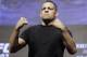 Nate Diaz poses during a UFC 202 mixed martial arts news conference, Thursday, July 7, 2016, in Las Vegas. Diaz is scheduled to fight Conor McGregor at UFC 202 in Las Vegas. (AP Photo/John Locher)