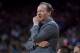 OAKLAND, CA - MARCH 23: Head coach Mike Budenholzer of the Atlanta Hawks looks on against the Golden State Warriors during an NBA basketball game at ORACLE Arena on March 23, 2018 in Oakland, California. NOTE TO USER: User expressly acknowledges and agrees that, by downloading and or using this photograph, User is consenting to the terms and conditions of the Getty Images License Agreement. (Photo by Thearon W. Henderson/Getty Images)