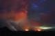 Lava shoots into the night sky from active fissures on the lower east rift of the Kilauea volcano, Tuesday, May 15, 2018, near Pahoa, Hawaii. (AP Photo/Caleb Jones)