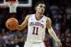 FILE - In this Feb. 17, 2018, file photo, Oklahoma guard Trae Young (11) brings the ball up court during the second half of an NCAA college basketball game against Texas, in Norman, Okla. Trae Young has had one of the best freshman seasons in NCAA history. His decision on whether to go pro or not looms. (AP Photo/Sue Ogrocki, File)
