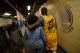 OAKLAND, CA - MARCH 1: Draymond Green #23 of the Golden State Warriors hugs his mom as he walks to the locker room after the game against the Atlanta Hawks on March 1, 2016 at Oracle Arena in Oakland, California. NOTE TO USER: User expressly acknowledges and agrees that, by downloading and or using this photograph, user is consenting to the terms and conditions of Getty Images License Agreement. Mandatory Copyright Notice: Copyright 2016 NBAE (Photo by Noah Graham/NBAE via Getty Images)