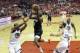 Houston Rockets guard James Harden (13) drives to the basket past Golden State Warriors defenders Andre Iguodala (9), Stephen Curry (30), and Kevin Durant (35) during the first half in Game 2 of the NBA basketball Western Conference Finals, Wednesday, May 16, 2018, in Houston. (AP Photo/David J. Phillip)