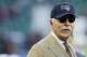 Stan Kroenke, the owner of the Los Angeles Rams and the largest shareholder of English Premier League football club Arsenal, stands in the field before an NFL football game against Arizona Cardinals at Twickenham Stadium in London, Sunday, October 22, 2017. (AP Photo / Matt Dunham)