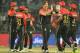 Royal Challengers Bangalore bowler Shane Watson (3R) celebrates with his team players after he dismissed Delhi Daredevils batsman Karun Nair (not in picture) during the 2017 Indian Premier League (IPL) Twenty20 cricket match between Delhi Daredevils and Royal Challengers Bangalore at The Feroz Shah Kotla Cricket Stadium in New Delhi on May 14, 2017. / AFP PHOTO / SAJJAD HUSSAIN (Photo credit should read SAJJAD HUSSAIN/AFP/Getty Images)