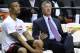 Portland Trail Blazers' Damian Lillard, left, chats with Trail Blazers GM Neil Olshey prior to the start of an NBA basketball game in Portland, Ore., Saturday, March 28, 2015. (AP Photo/Greg Wahl-Stephens)