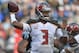 Tampa Bay Buccaneers' Jameis Winston (3) looks to pass against the Carolina Panthers during the second half of an NFL football game in Charlotte, N.C., Sunday, Dec. 24, 2017. (AP Photo/Mike McCarn)