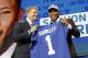 Commissioner Roger Goodell presents Penn State's Saquon Barkley with his New York Giants jersey during the first round of the NFL football draft, Thursday, April 26, 2018, in Arlington, Texas. (AP Photo/David J. Phillip)
