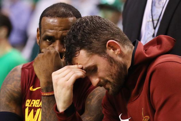 BOSTON, MA - MAY 15:  LeBron James #23 and Kevin Love #0 of the Cleveland Cavaliers react on the bench in the second half against the Boston Celtics during Game Two of the 2018 NBA Eastern Conference Finals at TD Garden on May 15, 2018 in Boston, Massachusetts. NOTE TO USER: User expressly acknowledges and agrees that, by downloading and or using this photograph, User is consenting to the terms and conditions of the Getty Images License Agreement.  (Photo by Maddie Meyer/Getty Images)