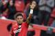 Leverkusen's Leon Bailey celebrates after he scored the opening goal during the German Bundesliga soccer match between Bayer Leverkusen and FSV Mainz in Leverkusen, Germany, Sunday, Jan. 28, 2018. (AP Photo/Martin Meissner)