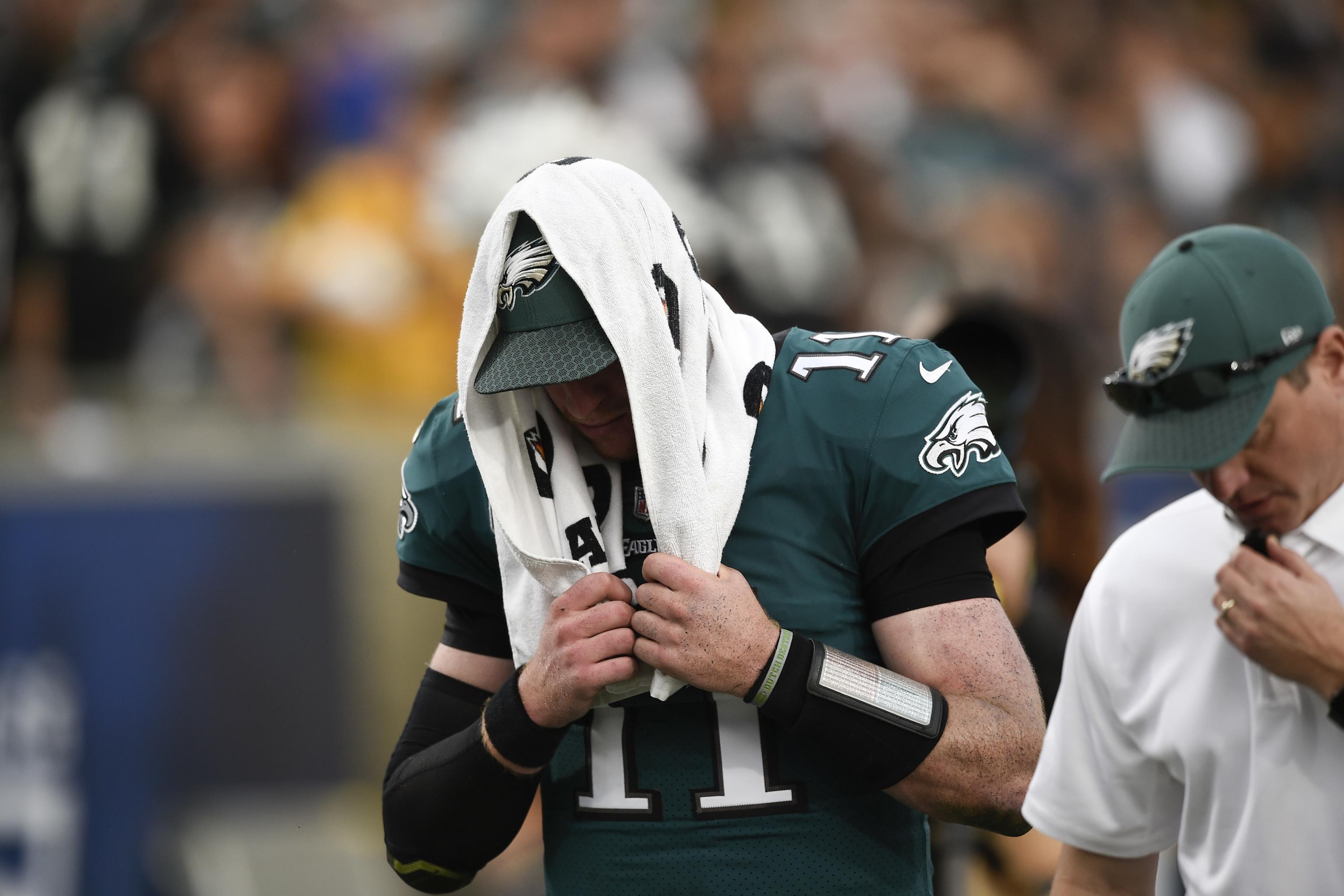 Eagles QB Carson Wentz (back) ruled out for showdown vs. Rams