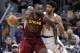 Cleveland Cavaliers' Kendrick Perkins (21) drives past New York Knicks' Isaiah Hicks (4) in the second half of an NBA basketball game, Wednesday, April 11, 2018, in Cleveland. The Knicks won 110-98. (AP Photo/Tony Dejak)