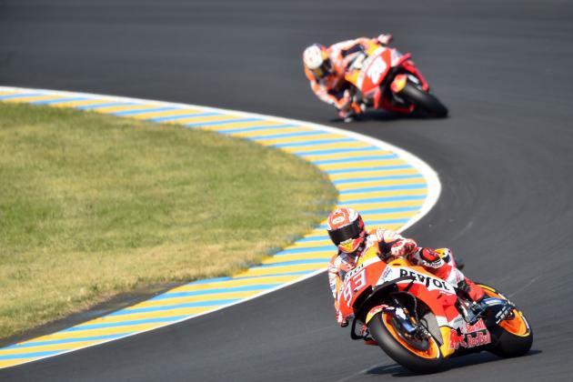 Repsol Honda Team's Spanish rider Marc Marquez drives ahead Repsol Honda Team's Spanish rider Dani Pedrosa during the warm-up ahead of the French motorcycling Grand Prix on May 20, 2018 in Le Mans, northwestern France. (Photo by JEAN-FRANCOIS MONIER / AFP) (Photo credit should read JEAN-FRANCOIS MONIER/AFP/Getty Images)