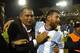 Argentina's Lionel Messi (R) celebrates after defeating Ecuador and qualifying to the 2018 World Cup football tournament, in Quito, on October 10, 2017. / AFP PHOTO / Javier Cazar (Photo credit should read JAVIER CAZAR/AFP/Getty Images)