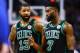 BOSTON, MA - MARCH 31: Marcus Morris #13 and Jaylen Brown #7 of the Boston Celtics look on during a game against the Toronto Raptors at TD Garden on March 31, 2018 in Boston, Massachusetts. NOTE TO USER: User expressly acknowledges and agrees that, by downloading and or using this photograph, User is consenting to the terms and conditions of the Getty Images License Agreement. (Photo by Adam Glanzman/Getty Images)