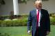 US President Donald Trump walks through the Rose Garden as he arrives to honor NASCAR Cup Series champion Martin Truex Jr. and his team, during a ceremony on the South Lawn of the White House in Washington, DC, May 21, 2018. (Photo by SAUL LOEB / AFP) (Photo credit should read SAUL LOEB/AFP/Getty Images)