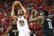 HOUSTON, TX - MAY 16: Stephen Curry #30 of the Golden State Warriors shoots against Clint Capela #15 of the Houston Rockets in the third quarter of Game Two of the Western Conference Finals of the 2018 NBA Playoffs at Toyota Center on May 16, 2018 in Houston, Texas. (Photo by Ronald Martinez/Getty Images)