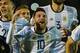 Argentina's Lionel Messi (C) celebrates after defeating Ecuador and qualifying to the 2018 World Cup football tournament, in Quito, on October 10, 2017. / AFP PHOTO / Juan Ruiz (Photo credit should read JUAN RUIZ/AFP/Getty Images)