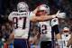 MINNEAPOLIS, MN - FEBRUARY 04: Rob Gronkowski #87 and Tom Brady #12 of the New England Patriots celebrate their 4-yard touchdown pass during the fourth quarter against the Philadelphia Eagles in Super Bowl LII at U.S. Bank Stadium on February 4, 2018 in Minneapolis, Minnesota. (Photo by Kevin C. Cox/Getty Images)