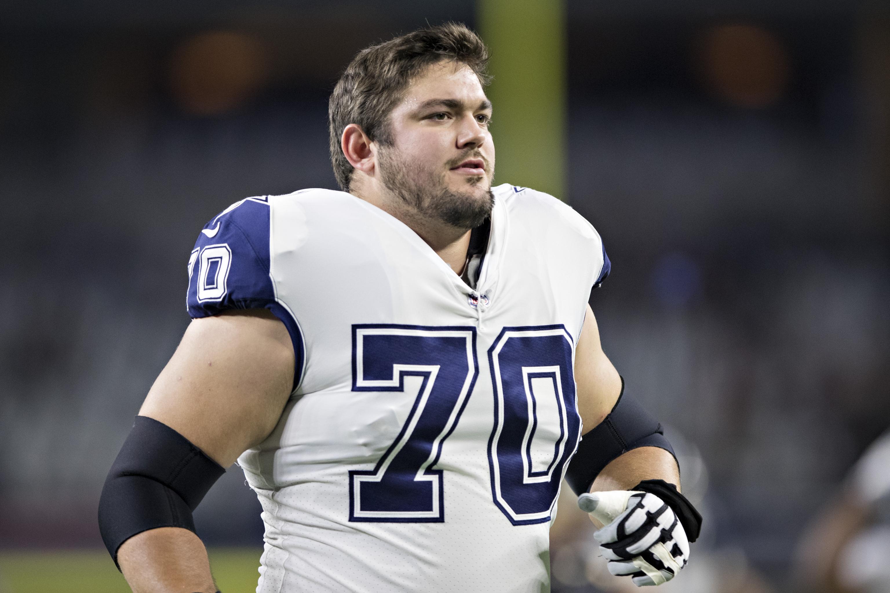 ARLINGTON, TX - DECEMBER 11: Dallas Cowboys Zack Martin (70) blocks during  the game featuring the