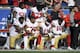 Members of the San Francisco 49ers kneel during the national anthem before an NFL football game against the Los Angeles Rams Sunday, Dec. 31, 2017, in Los Angeles. (AP Photo/Mark J. Terrill)