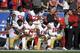 Members of the San Francisco 49ers kneel during the national anthem before an NFL football game against the Los Angeles Rams Sunday, Dec. 31, 2017, in Los Angeles. (AP Photo/Mark J. Terrill)
