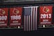 Three National Championship banners hang from the rafters at the KFC Yum! Center, the home of the University of Louisville men's basketball team, Saturday, Feb. 3, 2018, in Louisville, Ky. Louisville must vacate its 2013 men's basketball title following an NCAA appeals panel's decision to uphold sanctions against the men's program in the sex scandal case. The Cardinals will have to vacate 123 victories including the championship, and return some $600,000 in conference revenue from the 2012-15 NCAA Tournaments. (AP Photo/Timothy D. Easley)