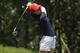 Arizona's Yu-Sang Hou watches her shot from the first tee during the final round of the NCAA Division I Women's Golf Championships in Stillwater, Okla., Wednesday, May 23, 2018. (AP Photo/Sue Ogrocki)