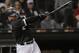 Chicago White Sox's Welington Castillo hits two-run single against the Texas Rangers during the eighth inning of a baseball game Thursday, May 17, 2018, in Chicago. (AP Photo/Nam Y. Huh)