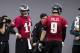 Philadelphia Eagles quarterback Carson Wentz in action along with Nick Foles, right, during practice at NFL football training camp, Tuesday, May 22, 2018, in Philadelphia. (AP Photo/Chris Szagola)