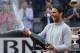 FILE - In this May 20, 2018, file photo, Spain's Rafael Nadal sprays sparkling wine as he celebrates defeating Germany's Alexander Zverev in the final match of the Italian Open tennis tournament in Rome. Nadal is 79-2 for his career in the French Open, a .975 winning percentage. (AP Photo/Gregorio Borgia, File)
