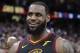 Cleveland Cavaliers' LeBron James walks off the court after hitting the game-winning shot against the Toronto Raptors in Game 3 of an NBA basketball second-round playoff series, Saturday, May 5, 2018, in Cleveland. Cleveland won 105-103. (AP Photo/Tony Dejak)