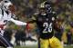 Pittsburgh Steelers running back Le'Veon Bell runs against the New England Patriots during an NFL football game at Heinz Field in Pittsburgh Sunday, Dec. 17, 2017. (Winslow Townson/AP Images for Panini)